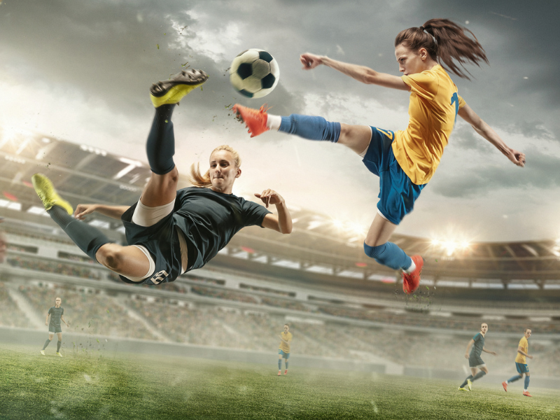 soccer-players-kicking-ball - 1