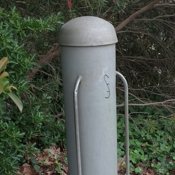 nbn street‑side telecommunications pillar located outside a property boundary, housing network cabling and connections.
