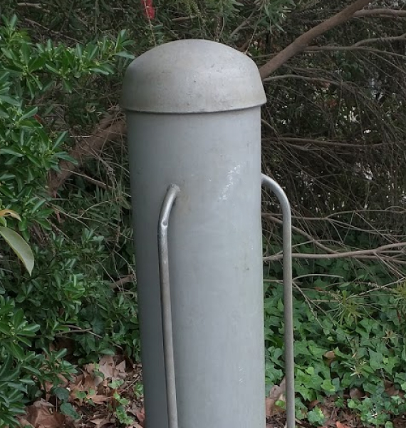 nbn street‑side telecommunications pillar located outside a property boundary, housing network cabling and connections.